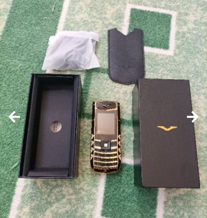 Мобилен телефон марка SERVO с две СИМ карти + кутия + зарядно + калъв