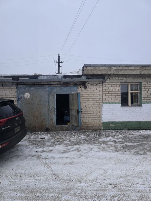 Продам гараж возле въезда гск 8.Взади автошопинга.