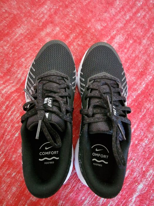 Vand adidasi Nike Run Defy femei