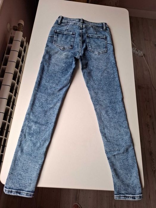 Чисто нови , дамски еластични слим дънки - размер 27 с повдигащ ефект