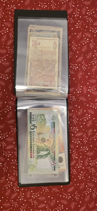 Vand album cu 20 bancnote.