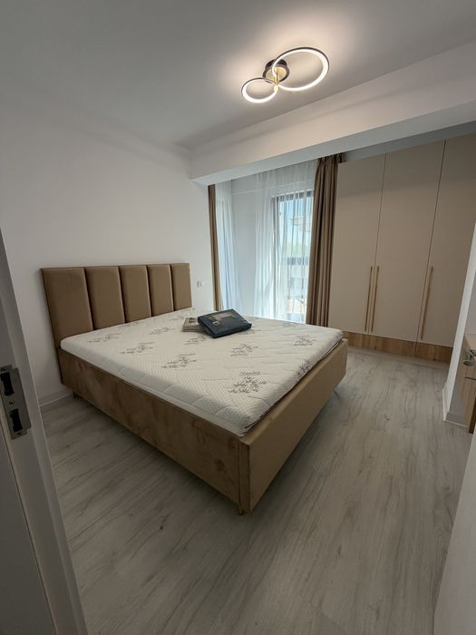 Proprietar inchiriez apartament 2 camere loc de parcare central Otopeni