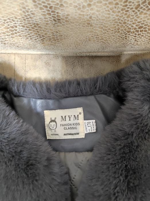 Продам меховую жилетку