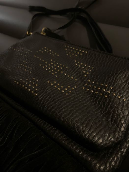 Кожаная сумочка в стиле бохо