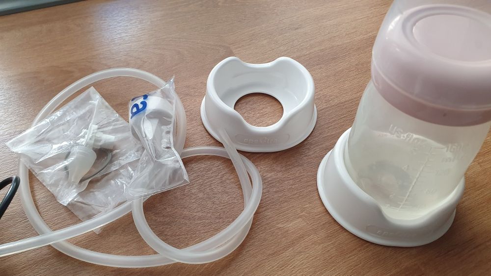 Pompa de san Spectra Q + rezerve noi