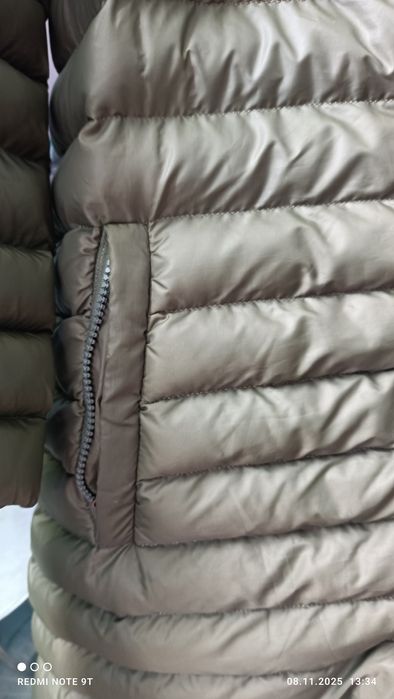 Женский пуховик-пальто.