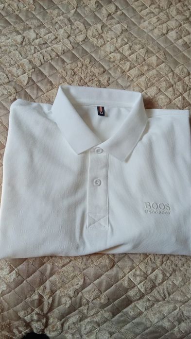 Продам тенниску . Новая.