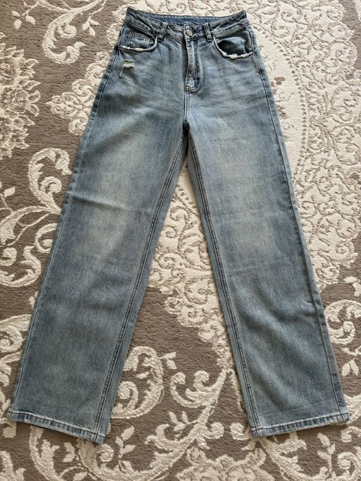 Новые стильные джинсы