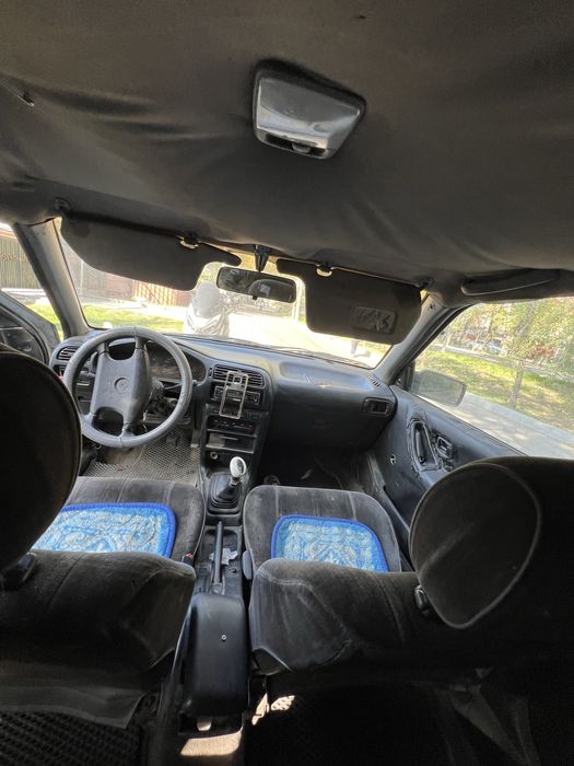 Машина ниссан сани