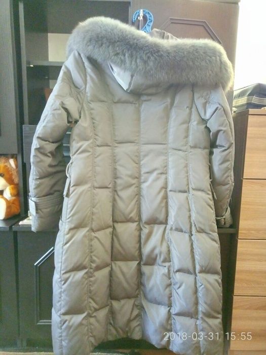 Женский пуховик.