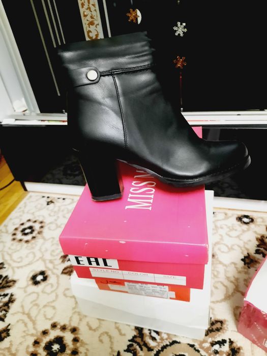 Кожанные сопоги черного цвета