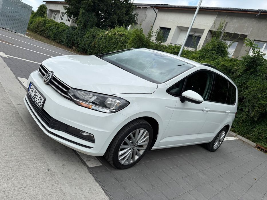 Volkswagen Touran Prim propietar cu verificare la reprezentanta km reali masina de Direc