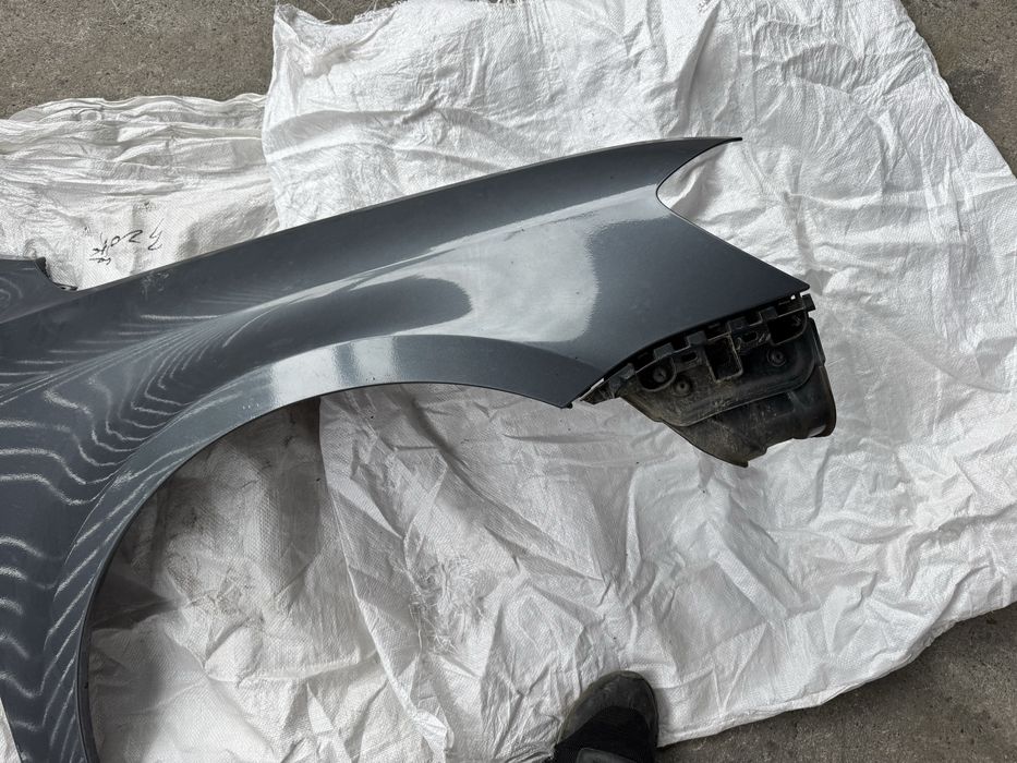 Aripa dreapta fata pt vw passat b7 pe verde