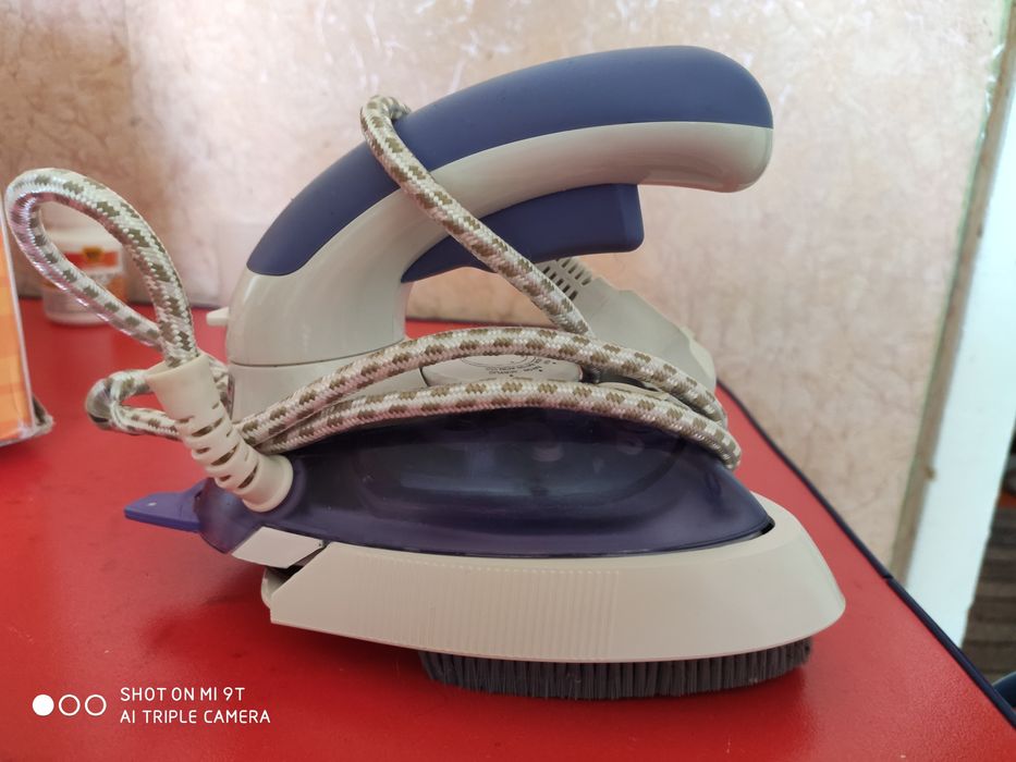 Утюг и отпариватель два в одном