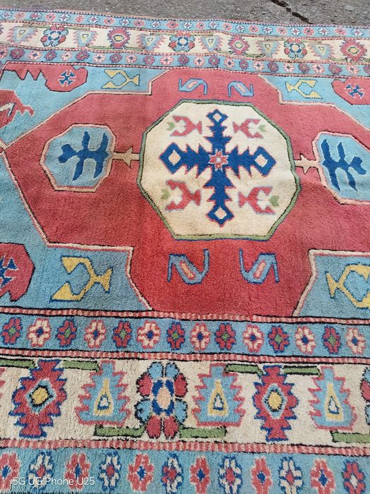 Ръчно тъкан килим