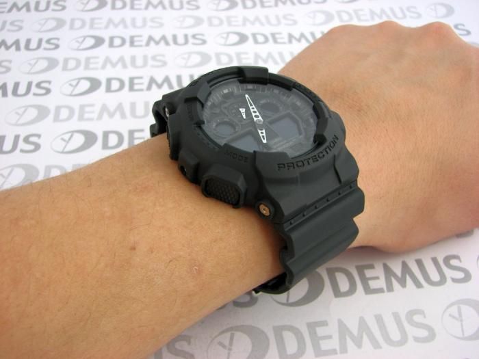 Мъжки часовник Casio G-SHOCK GA-100, черен, червен, внос от Германия