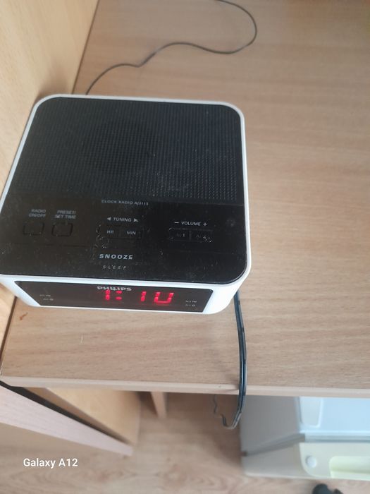 Radio cu ceas Philips, modelul AJ3115.