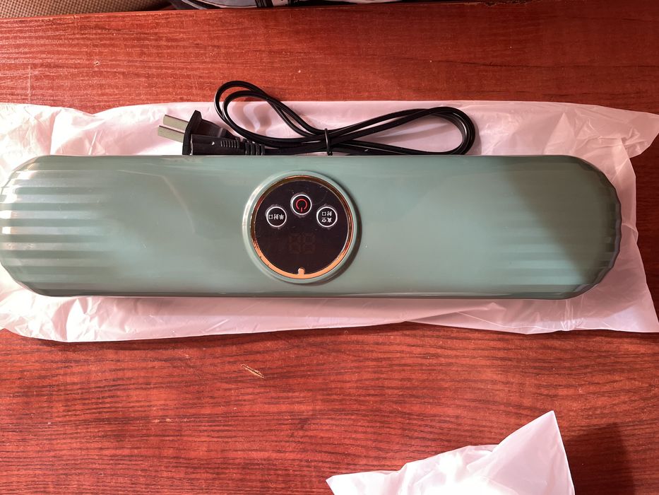 Вакуумный упаковщик