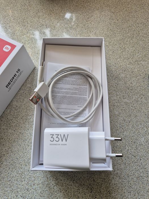 Смартфон Редми 15