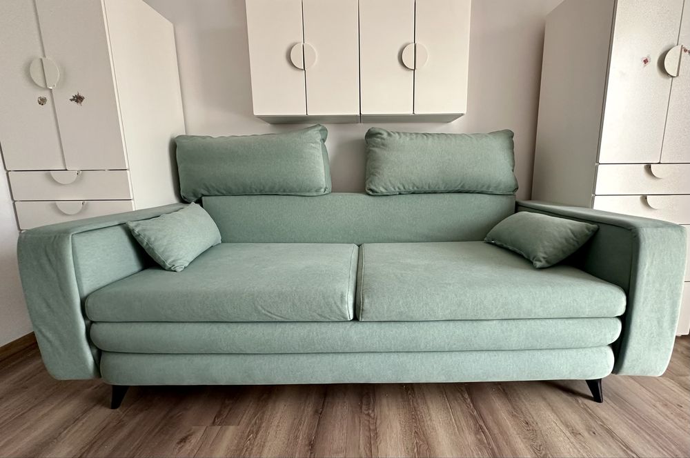 Canapea verde extensibila
