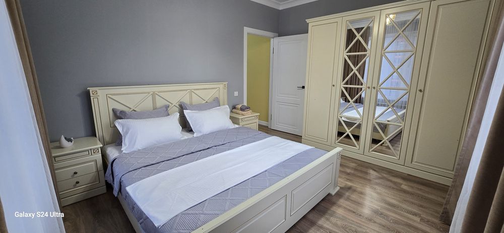 По часам апартаменты в Талане