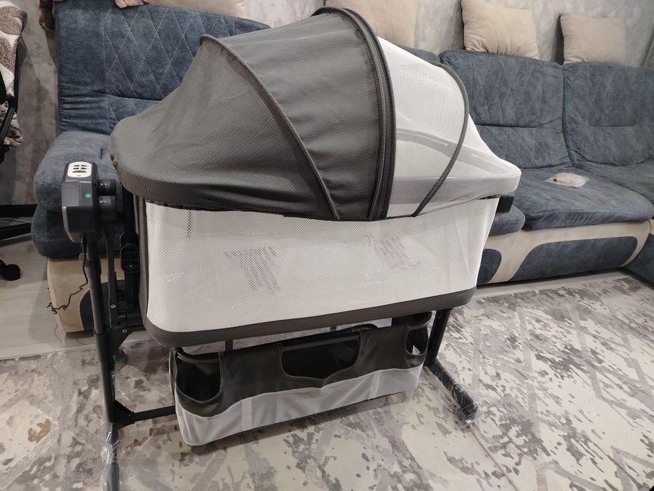 Продам электронную кровать-манеж