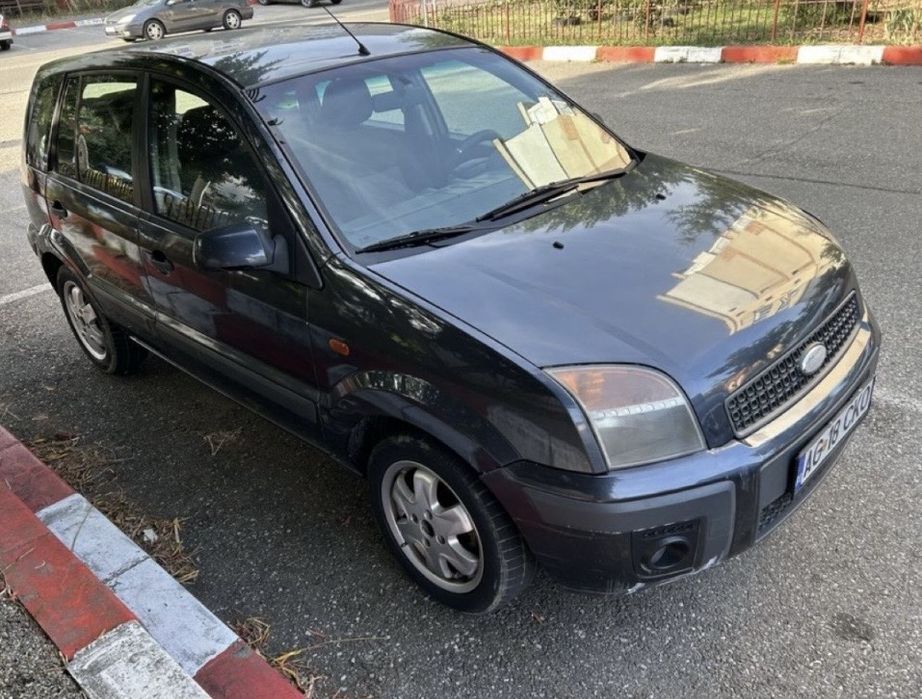 Ford Fusion 1.4 benzina pe gpl nare nici un cu defect accept schimb