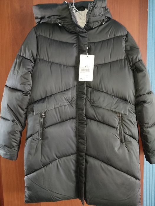 Продам пуховик.новый