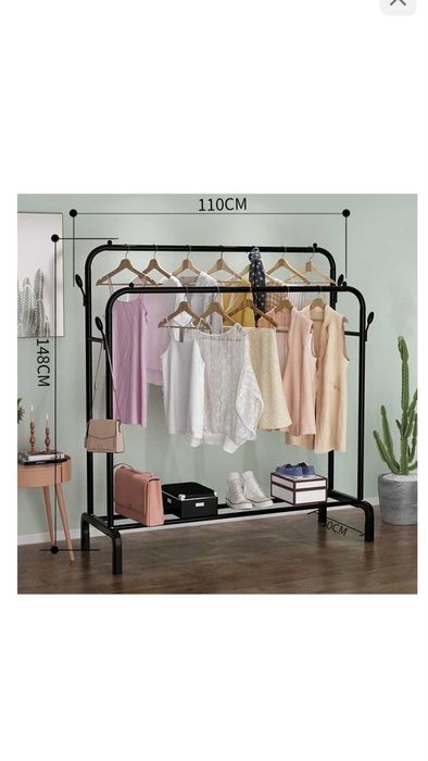 Вешалку для одежды новую продам