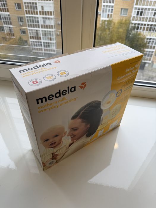 Молокоотсос Medela Swing Flex + аксессуары