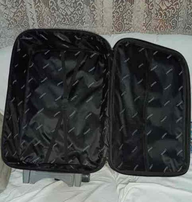 Куфар,голям,нов с колелца