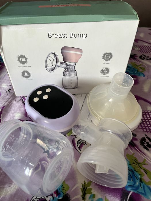 Продам Электрический молокоотсос Breast Pump