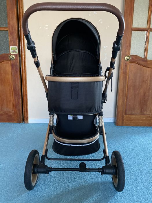 Продам коляску белеку черная