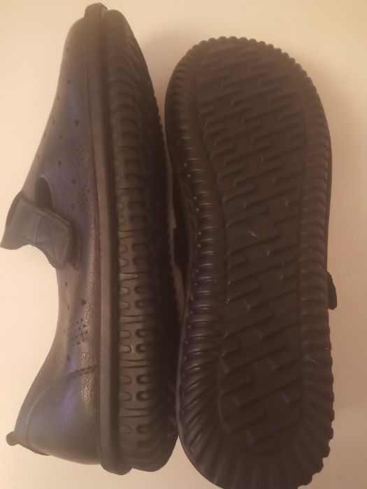 Новые кожаные туфли