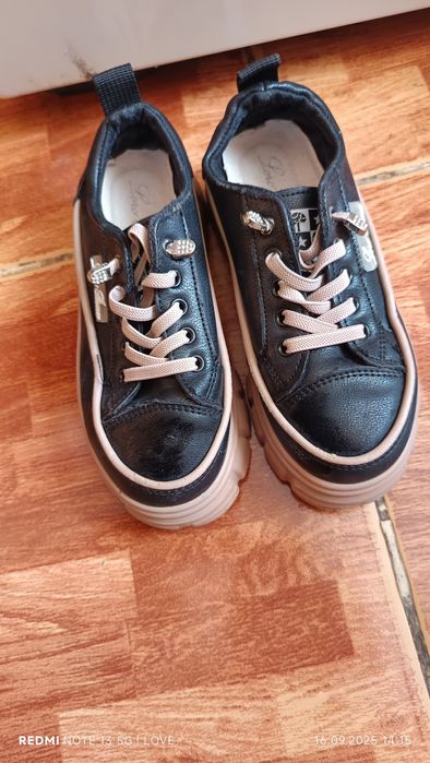 Аяқ киім келісімен