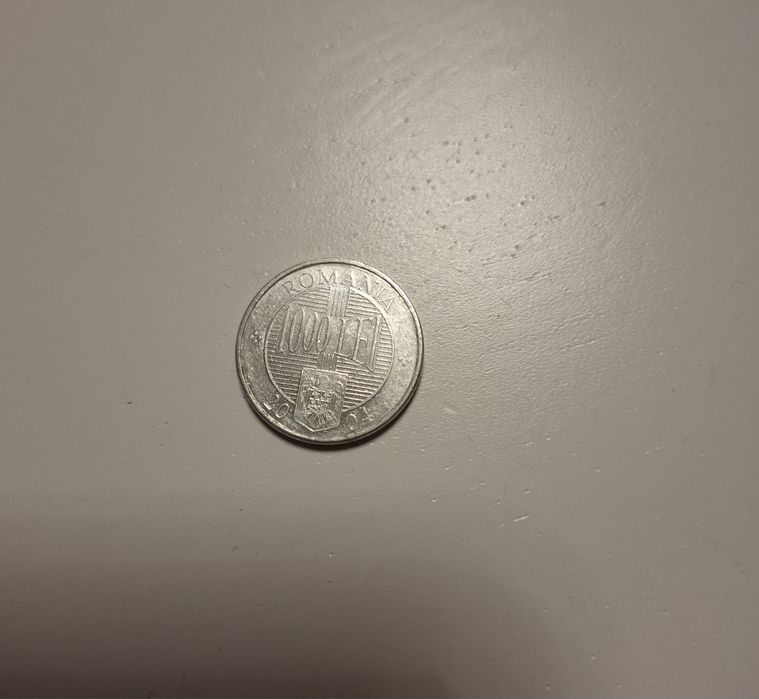 Vând moneda 1000 lei,anul 2004
