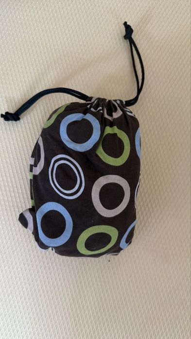 Suport portabil pentru scaun bebe Totseat – compact și practic