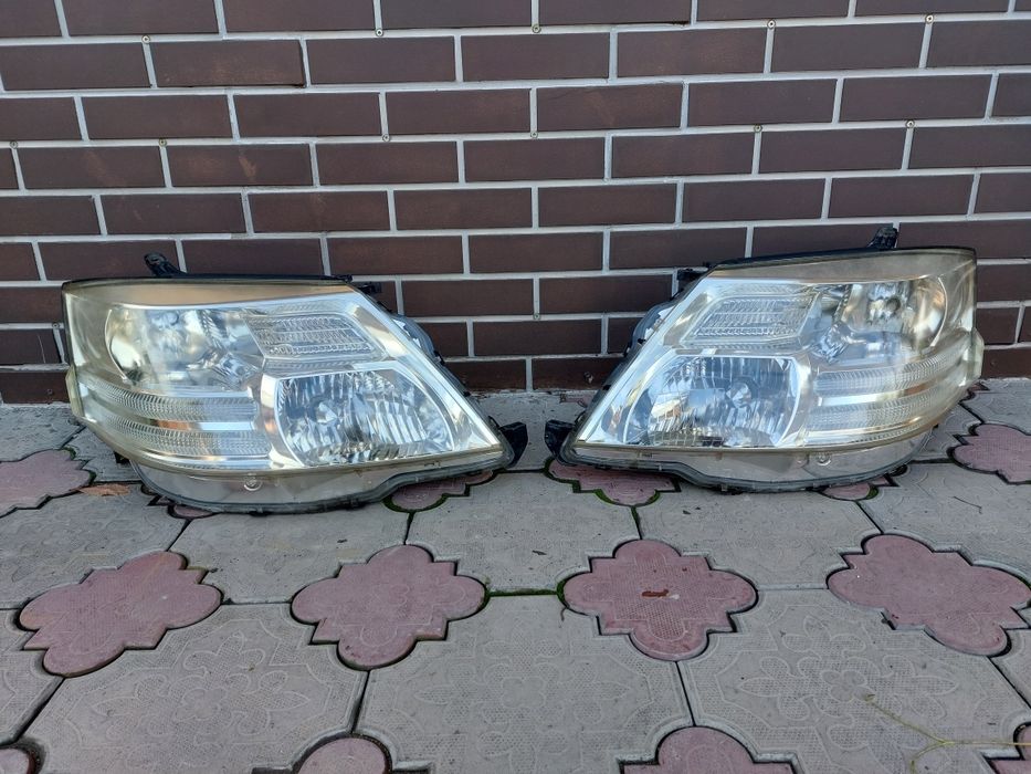 Фары Альфард привозные.