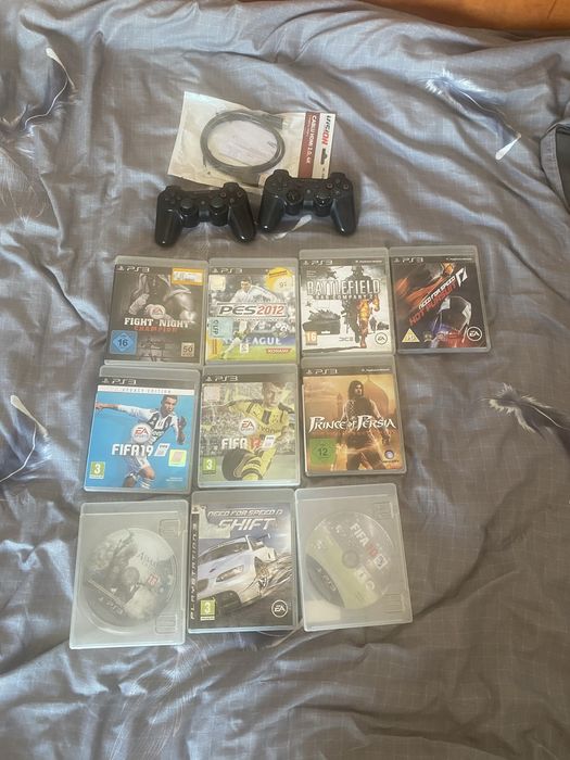 Vand Ps3 modat+ alte jocuri cu 2 manete