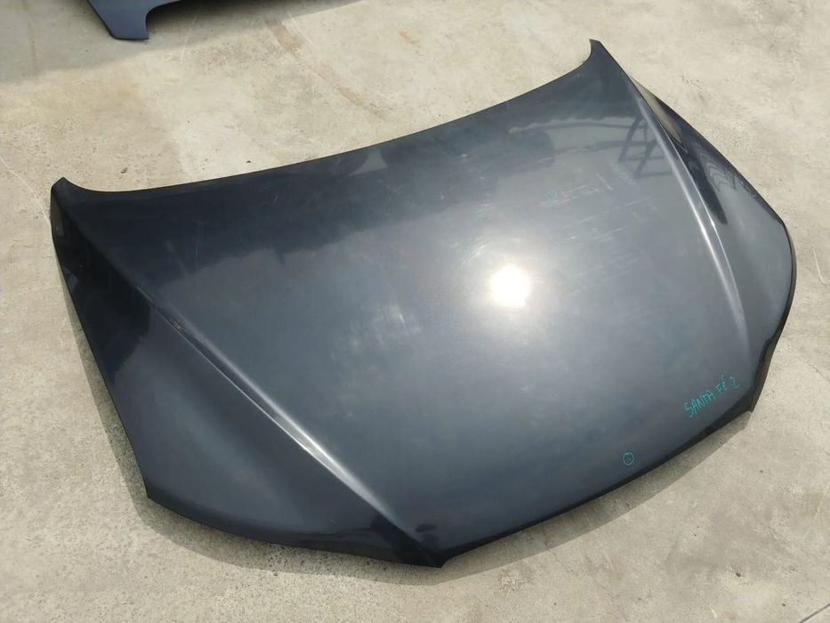 capota  hyundai santa fe 2 cm