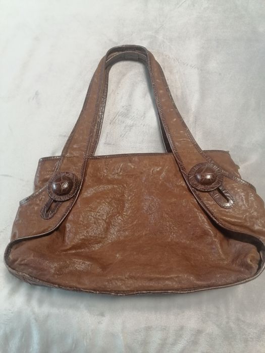 Коженная сумка коричнего цвета