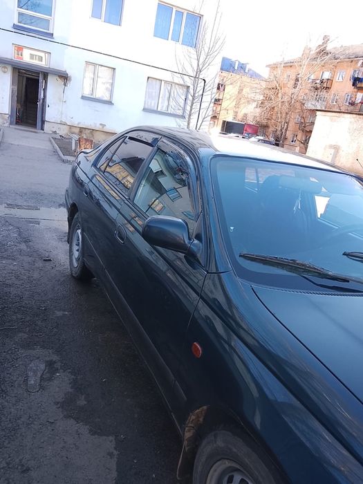 TOYOTA KARINA E машина продам торг есть