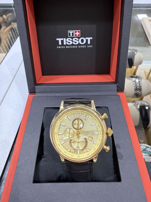 Золотые часы Tissot 750пробы