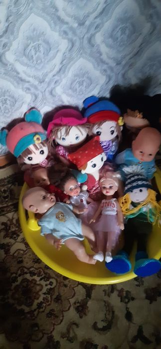 Игрушечные куклы разные