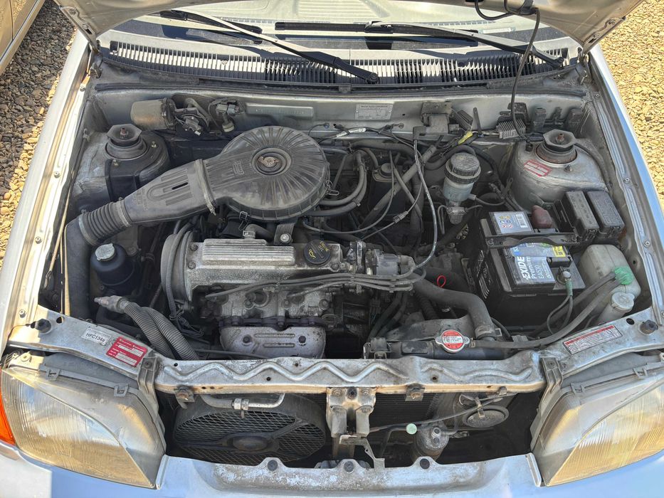Suzuki Swift 2003 automata, clima