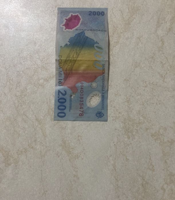 Bani vechi cu eclipsa și moneda de 5000 lei