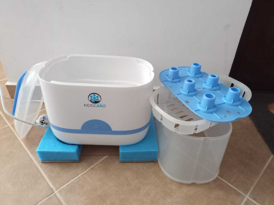 Sterilizator biberoane KidsCare ca nou, la cutie