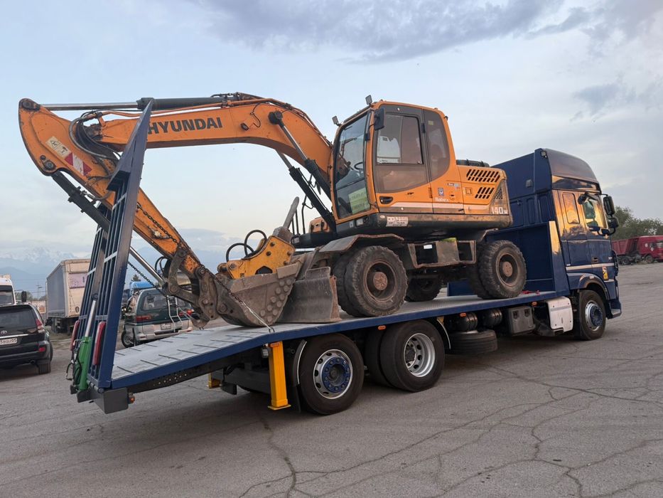 Услуги Трала перевозка спецтехники