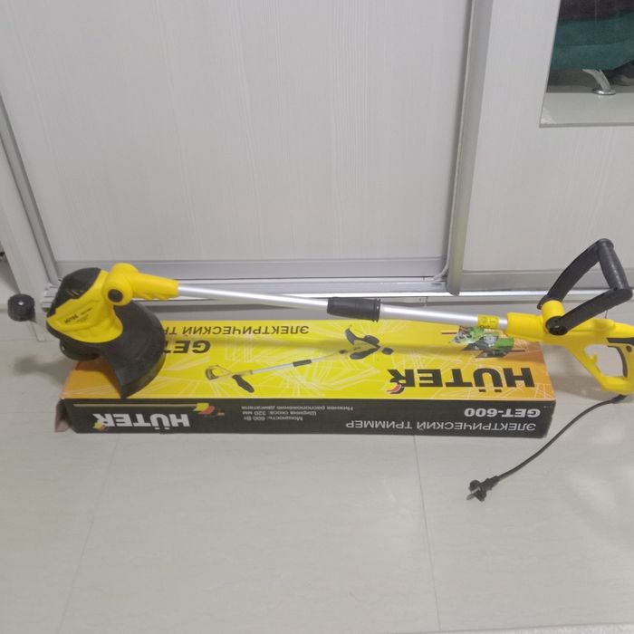 Электрический триммер Новый