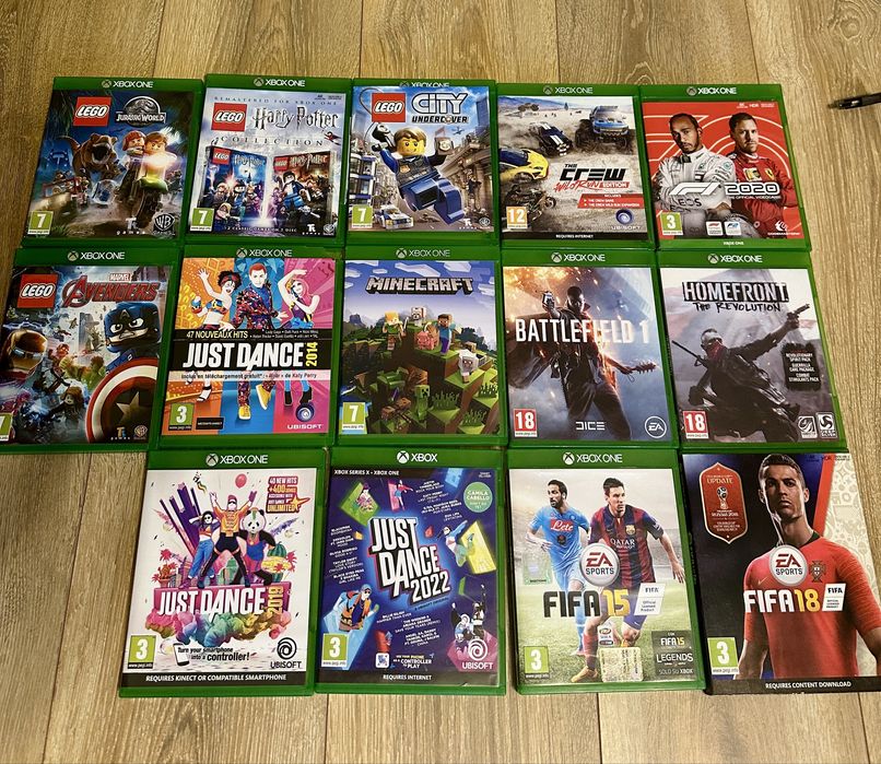 Xbox One cu Kinect + 2 telecomenzi si 14 jocuri – stare excelentă